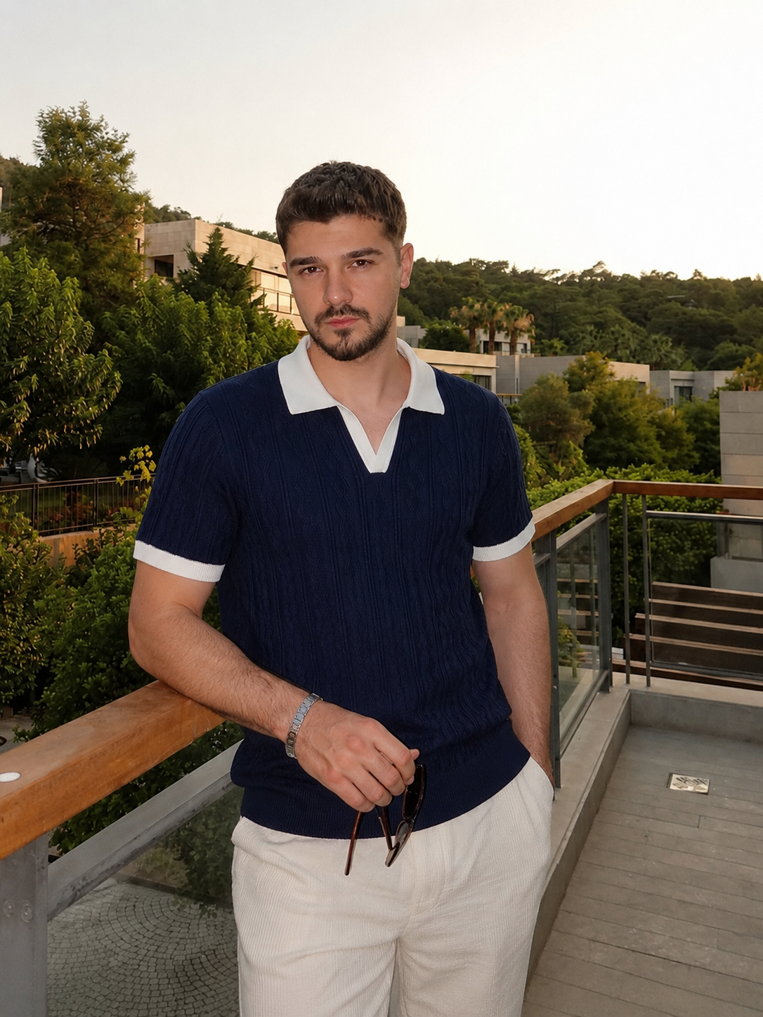 Man wearing the Riviera knit polo in summer