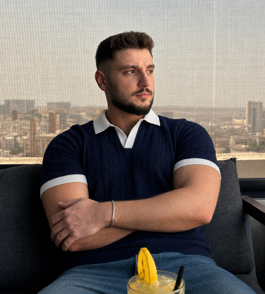 Customer wearing the contrast collar knit polo